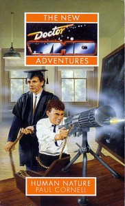 Yes, that's the Doctor feeding bullets into a machine gun fired by a schoolboy. No, I have no idea why they're looking in different directions.